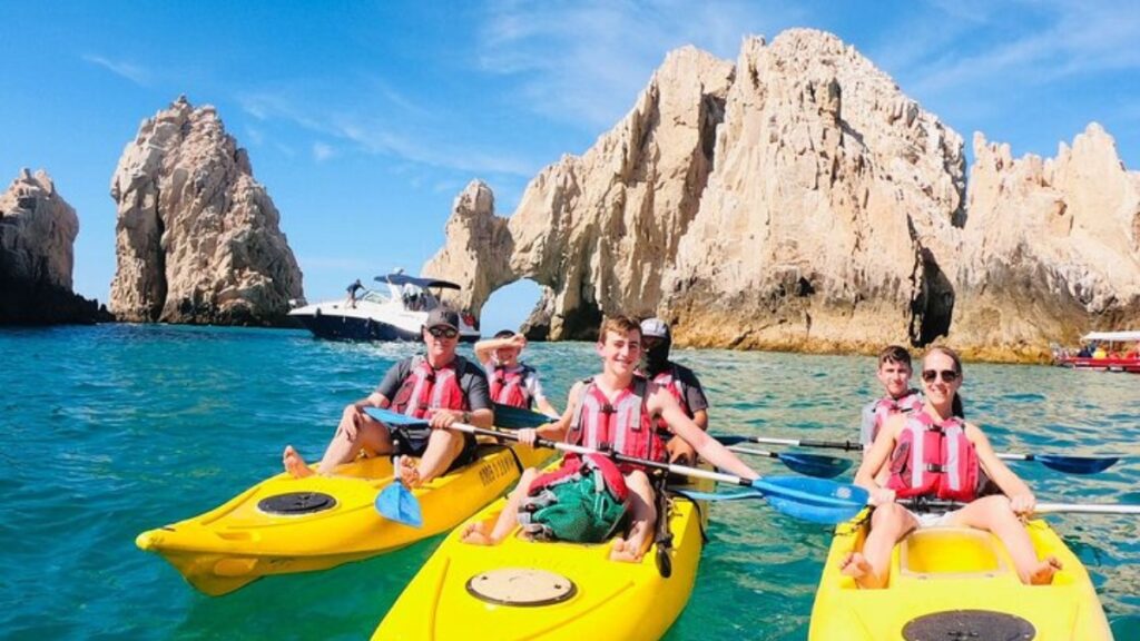 Kayakers with the Arch in the background